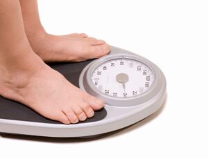 standing on scales
