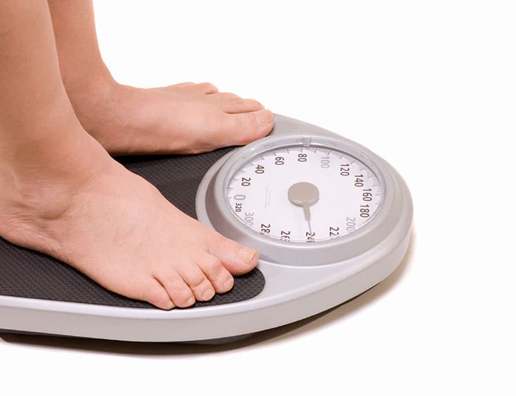 standing on scales